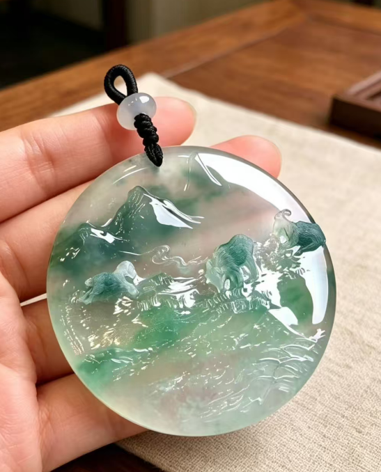 飄綠山水圓牌（三羊開泰）